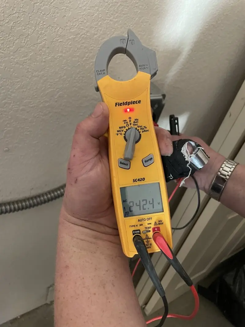 Voltage testing with clamp meter during Circuit Breaker Repair in St. Clairsville